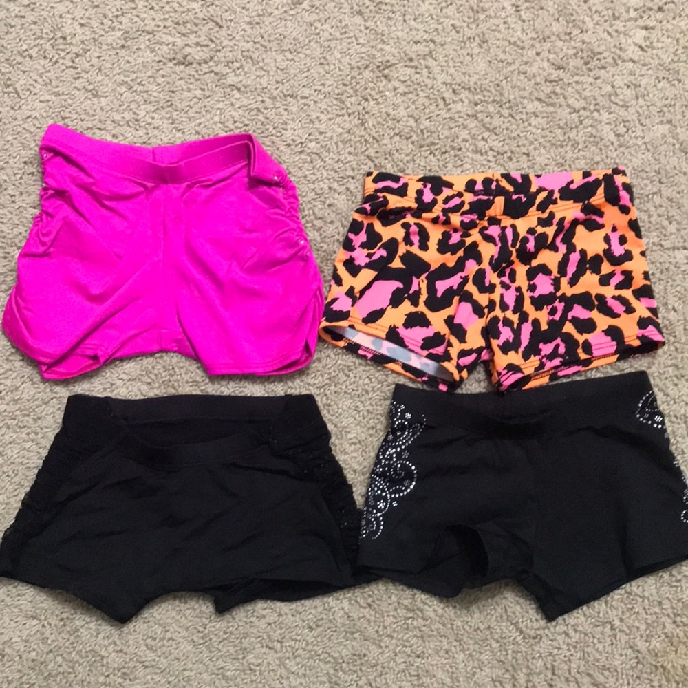 Motionwear set of 4 pairs of dance shorts size adult small